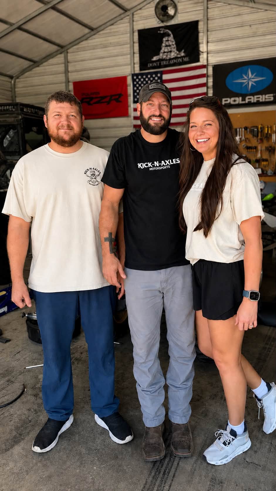 The Kick-N-Axles Motorsports crew together in the shop